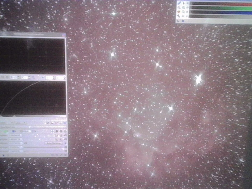 Computer monitor displaying PixInsight with a processed deep-sky image of a star field and faint nebulae. Several processing panels are open around the image, illustrating the astrophotography workflow.